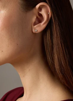 Geelgouden solitair oorstekers, 0.06 ct diamant, Groeibriljant