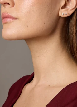 Geelgouden solitair oorstekers, 0.06 ct diamant, Groeibriljant